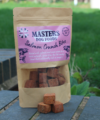 A photo of a bag of Masters Grain-Free Salmon Crunch Bites